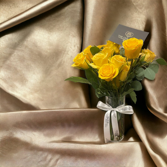 24 Stem Yellow Roses in a Clear Vase